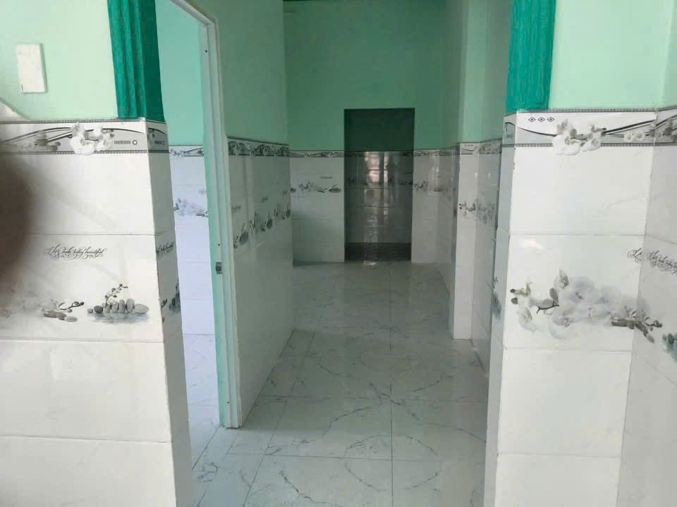 Bán nhà hẻm tỉnh lộ 15, xã Tân Thạnh Đông dt 100m2 full thổ 1 lầu ,3pn ,2wc giá 3,1 tỷ 2