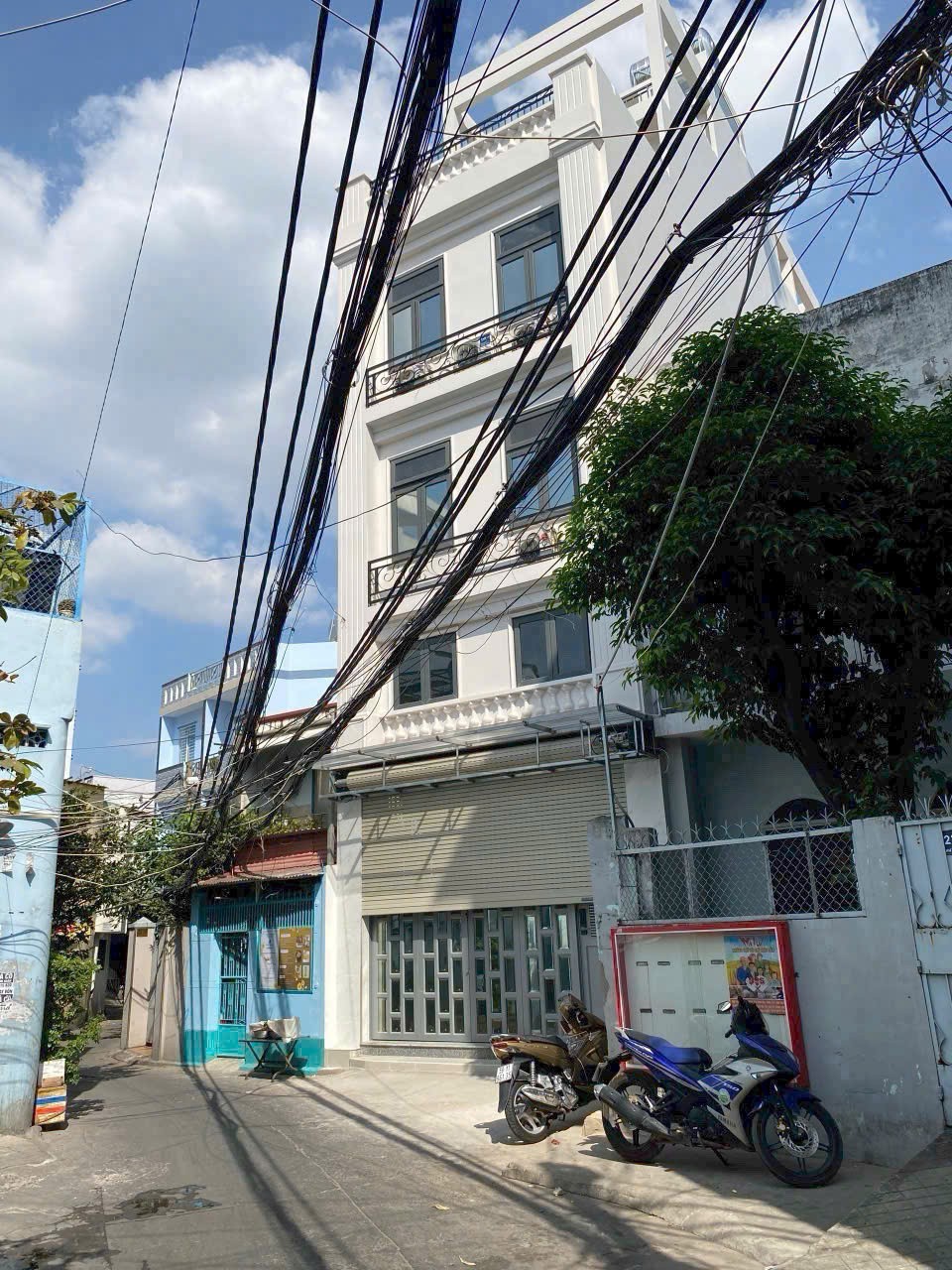 Bán nhà diện tích 120m2 có tổng 19P, gần chợ Huỳnh Đình Hai, BT - 6.1 x 20m - 6 tầng thang máy,