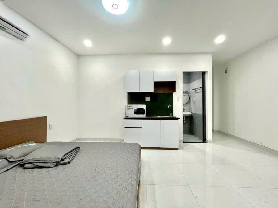 12 CHDV PHÚ NHUẬN LUÔN FULL PHÒNG - 7 TẦNG HẺM XE HƠI - DOANH THU 85TR/THÁNG - GIÁ 23T 8