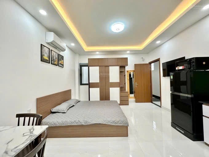 12 CHDV PHÚ NHUẬN LUÔN FULL PHÒNG - 7 TẦNG HẺM XE HƠI - DOANH THU 85TR/THÁNG - GIÁ 23T