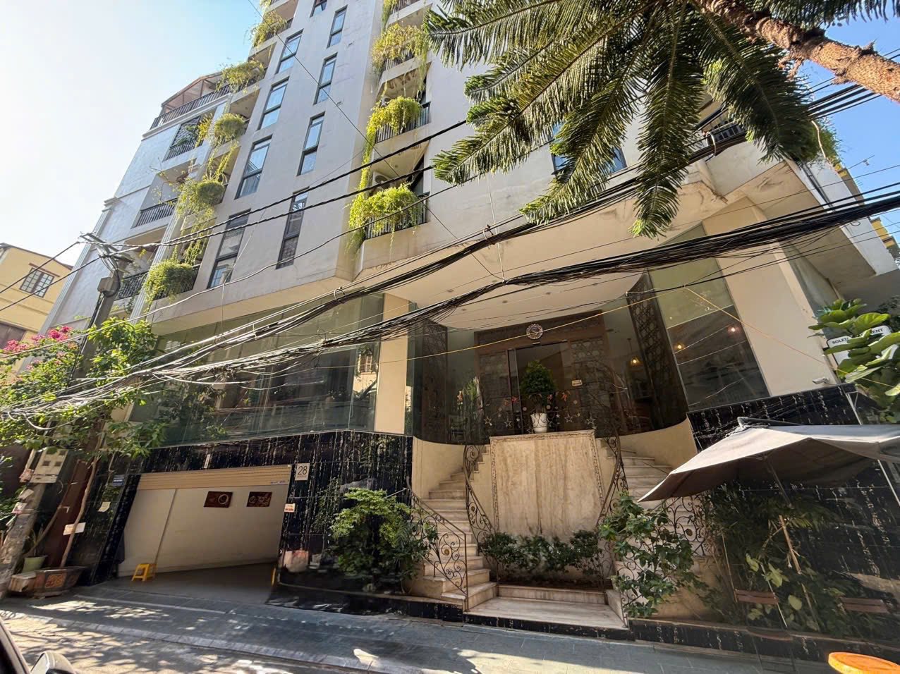 Tòa Apartment Lô Góc Hoàng Cầu Ô TÔ Dừng Đỗ 9 Tầng 64 Tỷ 2 Mặt Tiền Vỉa Hè