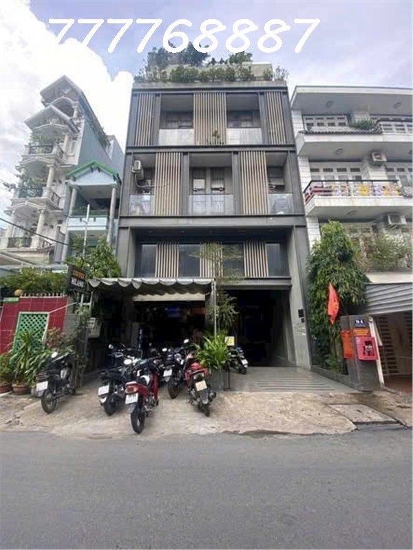 Bán tòa nhà VP - CHDV gần emart Phan Văn Trị hầm 6 tầng 1350m2 sàn
