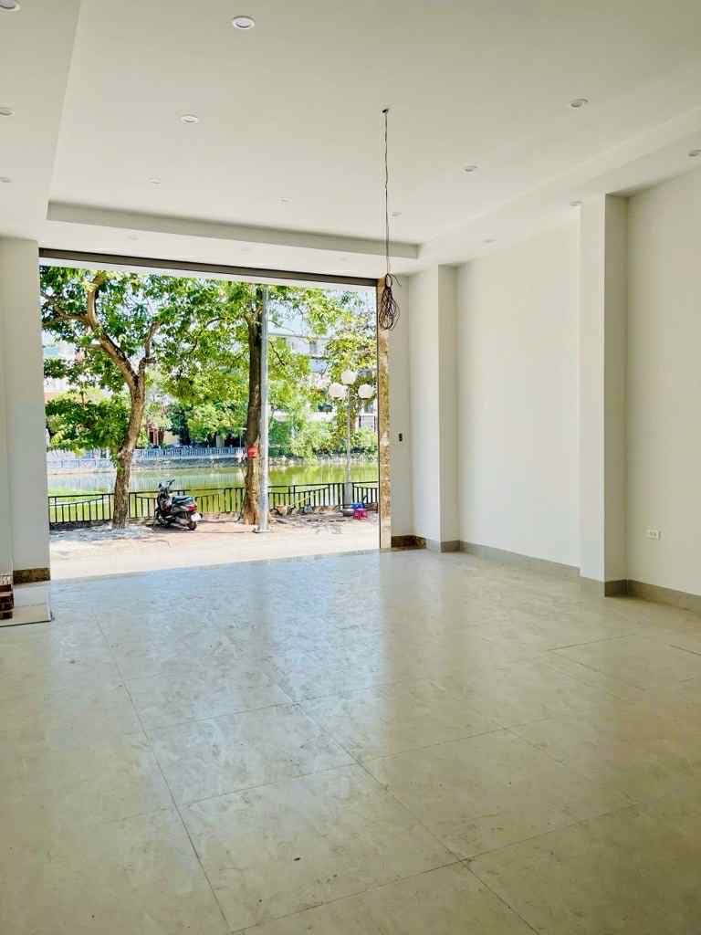 bán nhà lô góc mặt phố Long Biên, 100m x 7 tầng, mặt tiền 5.8m, view hồ, ôtô tránh, kinh doanh 3