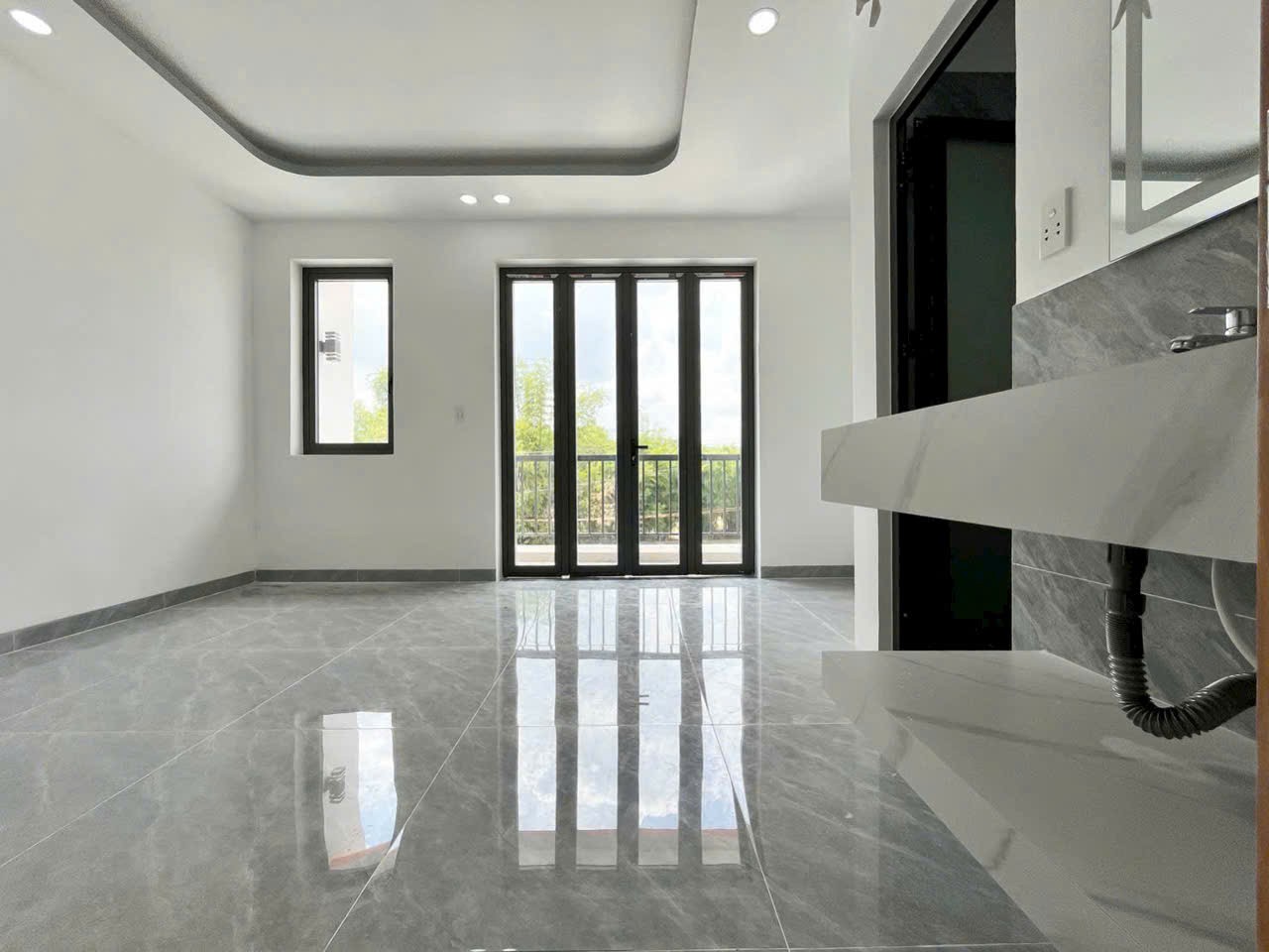 Bán nhà mới xây đường oto beton Đức Hòa Đông , dt 110m2 , 2 lầu , 4pn,4wc giá 2,8 tỷ 10
