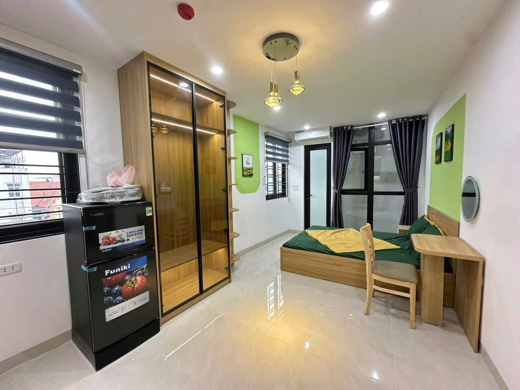 Bán tòa nhà căn hộ dịch vụ phố Chùa Láng DT 85m2, 7  tầng thang máy, gần Đại học Ngoại thương, 4