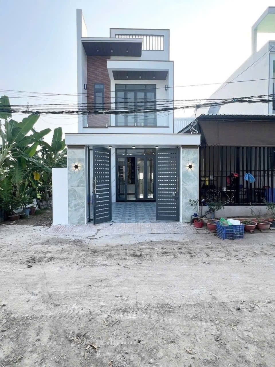 Bán nhà lầu mới xây ở xã Tân Bửu, Bến Lức dt 100m2 full thổ 1 lầu ,4pn,2wc giá 2,95 tỷ 4